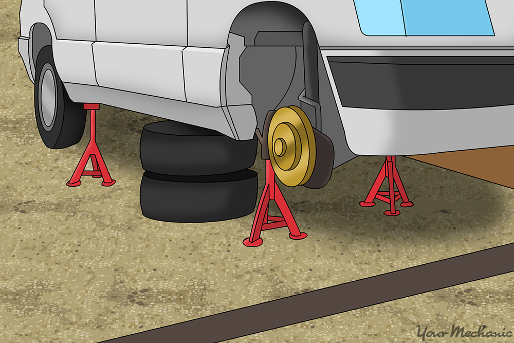 How to Properly Use a Floor Jack and Jack Stands YourMechanic Advice